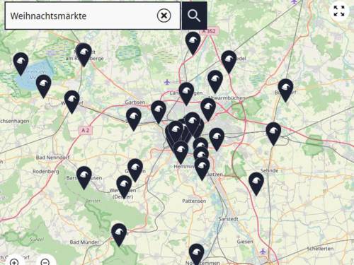 Karte, auf der Zipfelmützen Standorte von Weihnachtsmärkten in der Region Hannover symbolisieren